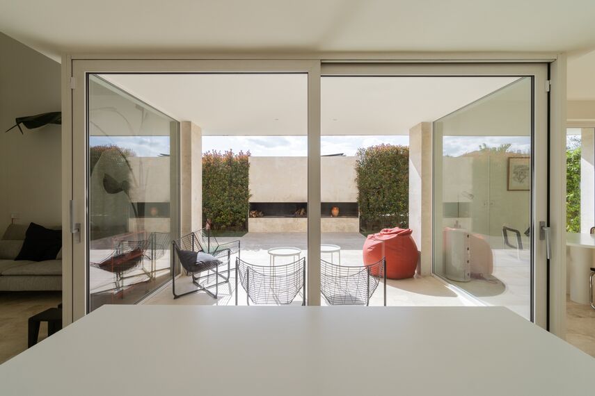 SlimLine 38 Windows, SlimLine 38 Doors and ConceptPatio 130 Sliding & Folding - Stone House located in Fiano Romano, Italy