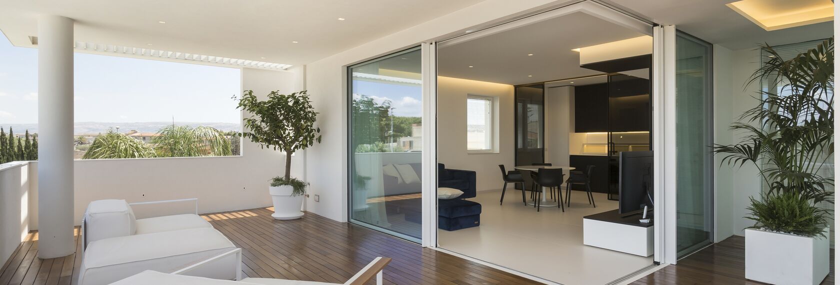 SlimPatio 68 Sliding & Folding, HiFinity Sliding & Folding, ConceptSystem 77 Windows and CS 77 Hidden Vent Windows - Casa D located in Ragusa, Italy