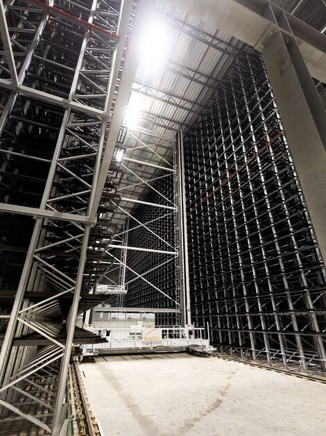 Inside view of high-bay warehouse at Reynaers Campus.